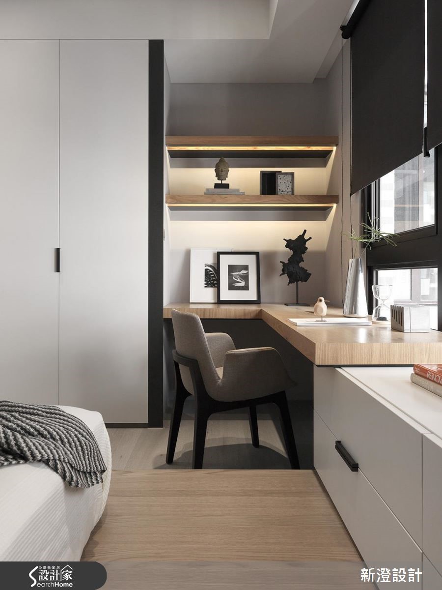 52 坪居家，設計師引用經典的黑白色調，在低彩主調中